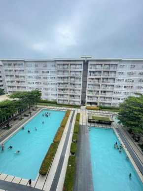 Cozy 1 BR Condo with PS4 at Trees Residences